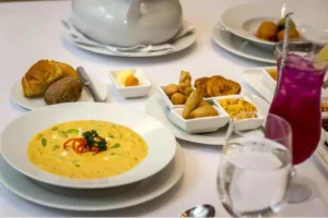 Casa Gangotena Boutique Hotel's Holy Week special meal, featuring fanesca soup and assorted dishes.