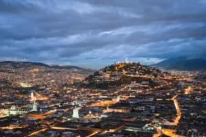 Breathtaking view of Quito at dusk near Casa Gangotena Boutique Hotel.