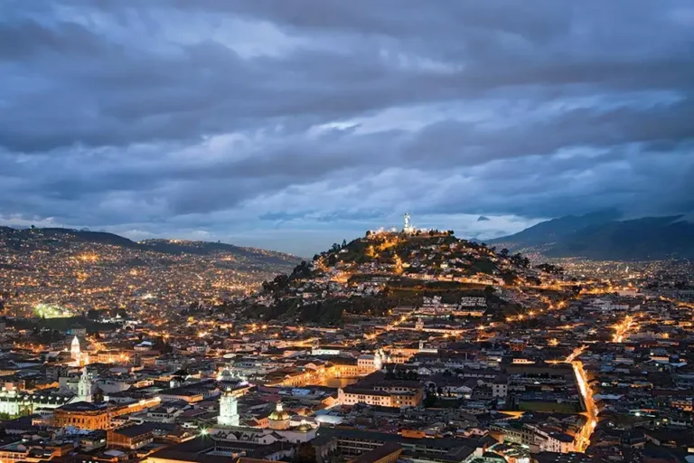 Aerial view of Quito's historic center at dusk Aerial view of Quito's historic center at dusk