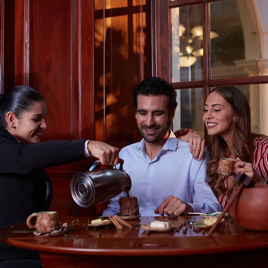 Guests enjoying a chocolate tasting at Casa Gangotena, Hotel Quito's Boutique